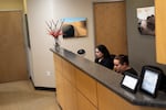 Medical Assistants Leyda Martinez and Bethany Smith, at Dermatology Professionals operating at the Lloyd Center. Dermatologist Claudia Taylor has customized the space for her solo practice, and the Lloyd Center closure represents a loss for her business.