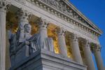 Light illuminates part of the Supreme Court building on Capitol Hill in Washington, D.C., Nov. 16, 2022.