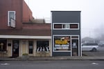 The Monte’s Coins and More neon sign glows on a foggy day in Stayton, Ore., on Jan. 14, 2026.