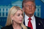 Attorney General Pam Bondi speaks with reporters in the James Brady Press Briefing Room at the White House, Monday, Aug. 11, 2025, in Washington, as President Donald Trump looks on.