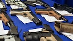 "Ghost guns" seized in federal law enforcement actions are displayed at the Bureau of Alcohol, Tobacco, Firearms and Explosives field office in Glendale, Calif., in April 2022.