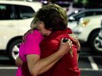 Church members console each other after a shooting at the Saint Stevens Episcopal Church on Thursday, June 16, 2022 in Vestavia, Ala.