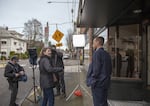 OPB's Jessica Martin behind the scenes with film producer Eric Slade during the filming of "Oregon Art Beat" in 2019.