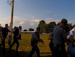 Law enforcement at former President Donald Trump's Butler, Pennsylvania rally on July 13 are captured on body camera footage carrying out one of the wounded victims from the assassination attempt on Trump.