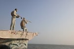 A sculpture overlooking the Strait of Hormuz is seen along the seafront in the port city of Bandar Abbas, in southern Iran, on Aug. 10.