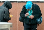 FILE: Unidentified people with drug paraphernalia in downtown Portland, Ore.