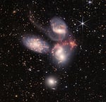 An enormous mosaic of Stephan's Quintet is the largest image to date from NASA's James Webb Space Telescope, covering about one-fifth of the Moon's diameter. It contains over 150 million pixels and is constructed from almost 1,000 separate image files. The visual grouping of five galaxies was captured by Webb's Near-Infrared Camera (NIRCam) and Mid-Infrared Instrument (MIRI).