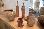 Multiple artists came together to fire these clay pieces during the spring of 2015 at the East Creek Anagama, which means "cave kiln" in Japanese and is based on an ancient Asian design.