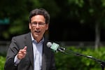Washington Gov. Bob Ferguson speaks at an unveiling of a statue of former NBA player and coach Lenny Wilkens outside of Climate Pledge Arena, Saturday, June 28, 2025, in Seattle.