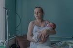 Anastasia, 24, with her daughter, born the previous day, in a room at the Sloviansk City Clinical Hospital, on March 28.