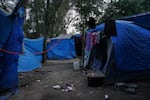 Abandoned tents remain at the migrant camp in Matamoros, Mexico, that is at the center of a controversy involving viral images of a flyer encouraging migrants to vote for President Biden.