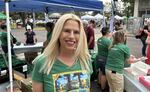 Nancy Newton, Springfield's City Manager, works a table where visitors can win free prizes celebrating the city and its ties to "The Simpsons."