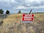 Along a highway just south of Fox, Ore., ranch owners post their support for the movement to join Idaho.
