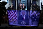 As seen on a TV monitor in the James S. Brady Press Briefing Room of the White House, President Trump speaks from the Cross Hall of the White House on April 1, 2026 in Washington, DC.