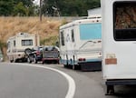 A row of RVs parked on a street in Northeast Portland on Sept. 10, 2025. Mayor Keith Wilson has reversed a policy that allowed people to retrieve towed "lived-in vehicles" from city lots for free.
