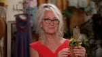 Elaine Falbo-Lowe shows off a piece of her hand crafted fairy furniture at her Northeast Portland shop on June 24, 2024.