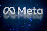 A photograph taken during the World Economic Forum (WEF) annual meeting in Davos on January 19, 2025, shows the logo of Meta, the US company that owns and operates Facebook, Instagram, Threads, and WhatsApp. 