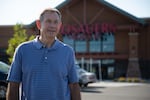 Ridgefield Mayor Don Stose stands outside of his town's new supermarket, Rosauers, in late September. The town's growth is an example of changing demographics that may factor into the race to represent Washington's 3rd Congressional District.