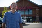 Ridgefield Mayor Don Stose stands outside of his town's new supermarket, Rosauers, in late September. The town's growth is an example of changing demographics that may factor into the race to represent Washington's 3rd Congressional District.