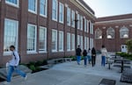 Students on the entry walkway of Benson Polytechnic High School, Portland, Ore., Aug. 27, 2024.  Benson is a technical public high school that offers courses in subjects as wide-ranging as healthcare, automotive/aviation technology, and radio broadcasting. The school was recently remodeled to provide even better access to industry-standard technologies. 