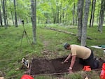 Jonathan Alperstein, one of the researchers on the new paper, excavates a portion of land on an ancient agricultural site in Michigan.
