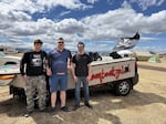 Daniel Tipton, Dorian Tipton, and Matt Van Meter pose in front of their "masterpiece," the Lamboatghini.
