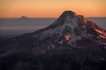Mount Jefferson, left, and Mount Hood, seen from the air, in September. 