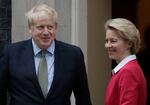 Britain's Prime Minister Boris Johnson greets European Commission President Ursula von der Leyen outside 10 Downing Street in London.  Johnson and European Commission President Ursula von der Leyen have agreed to stay in contact over coming days as their negotiating teams step up efforts to conclude a post-Brexit trade deal between the U.K. and the European Union. With less than two months to go before the U.K. exits the EU’s economic orbit, a spokesman at Johnson’s Downing Street office said the negotiating teams would “redouble efforts to reach a deal” when the talks resume in London on Monday, Nov. 9, 2020.  