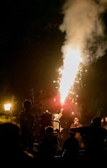 People shoot off fireworks at Sellwood Riverfront Park on the 4th of July. Despite a citywide firework ban, PF&R has responded to 24 firework-caused fires since June 23, when legal sales began around the state.