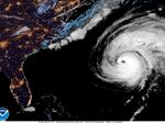 Hurricane Fiona moves up the United States Atlantic coast, Thursday night, Sept. 22, 2022. This image provided by the National Hurricane Center shows a satellite view as Hurricane Fiona pounded Bermuda with heavy rains and winds.
