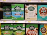 Boxes of Green Mountain Keurig coffee K-Cup pods are seen on display at a Target store. The Securities and Exchange Commission has announced that they are charging Keurig Dr Pepper over inaccurate claims made by the company about the recyclability of its disposable K-Cup pods.