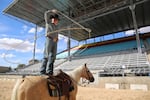 Trick roper Rider Kiesner nonchalantly twirls a lasso around himself as he rehearses for opening night of the Happy Canyon show at the Pendleton Round-up.