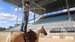 Trick roper Rider Kiesner nonchalantly twirls a lasso around himself as he rehearses for opening night of the Happy Canyon show at the Pendleton Round-up.