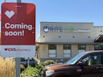 A sign outside the Rite-Aid on West 29th Avenue in South Eugene says it will become a CVS soon.