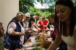 Local volunteers share an afternoon meal after completing some work, like cleaning up sidewalks and tending to gardens in Bilhorod-Dnistrovskyi in May. Villages in southwest Ukraine are generally small and poor. Soviet monuments still decorate the parks. And the area is ethnically varied, with Bulgarian towns, Moldovan, Russian, Ukrainian and others.