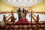 People walk into the prayer hall Sunday, Sept. 22, 2024, at the Sikh Temple of Wisconsin in Oak Creek, Wis. Angela Major/WPR