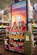 A display of THC drinks at Total Wine and More in Arlington, Va., includes a sign that says "The New Happy Hour."