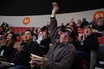 Fans cheer during the costumed race at the One Moto at Veterans Memorial Coliseum in Portland, Ore.