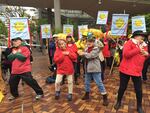 Protesters danced to their own version of "YMCA" in which they asked PGE why the utility is considering natural gas when wind and solar energy would be better for the planet.