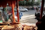 Loaves of bread in a bakery window in Kabul in 2022. The women who wait outside in the hope of getting some bread are suffering from the unstable economy, brought on by events of the past five years: conflict, pandemic closures, droughts.