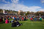 Students spread out on the Lincoln High School football field.