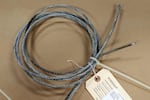 This cable, burned in half by an arc of high-voltage electricity, was recovered from a damaged substation in Toledo, Washington, on Aug. 5, 2022.