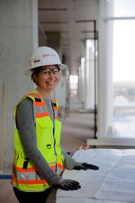 OHSU Biologist Tiffani Howard tells builders what scientists want in the new building. She's standing in what she calls 'the collabrador,' a main corridor where scientists will gather to collaborate.  