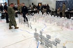 Emergency planners could move pins representing earthquake response resources during an exercise at Camp Murray, Washington, on May 4.