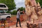 Johnny Kimball continues a large gnome carving. The main pieces are carved over the duration of the 3-day event and are judged on Sunday.