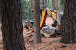 The Forest Service began work to repair erosion and other road damage in the fall of 2015. The total cost for rehabilitation is expected to come to $200,000. Here, a road crew moves boulders into place along one of the damaged roads.