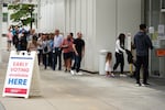 In this file photo, voters head into a polling location to cast their ballots on the last day of early voting for the 2024 election on November 1, 2024 in Atlanta, Georgia. A new federal report shows early in-person voting increased from 2020 to 2024.