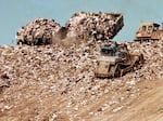 Garbage is dumped at the Fresh Kills Landfill in Staten Island, New York, in 1989.