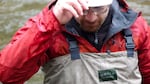 OSU's Kevin Weitemier takes a break between collecting water samples in a stream. 