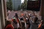 Students raise their hands and voices against gun violence in schools, as part of a nationwide protest on Apr. 20, 2018. 